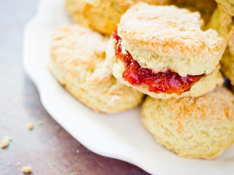 Scone with clotted cream and strawberry jam