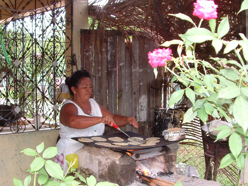 Honduran woman making tortillas