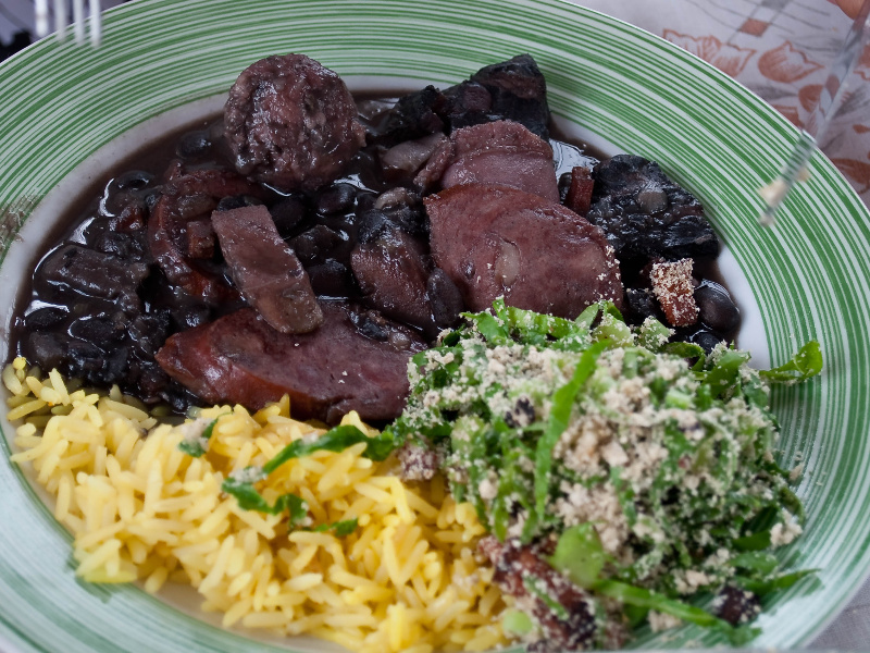 Plate with Brazilian feijoada completa