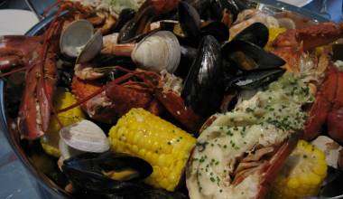 Clambake (American New England seafood and vegetable beach barbecue)